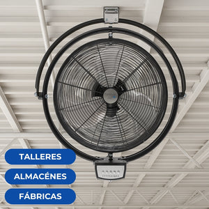 Ventilador NarvikAir 20" enfriando un área de trabajo en un taller mecánico con herramientas al fondo.